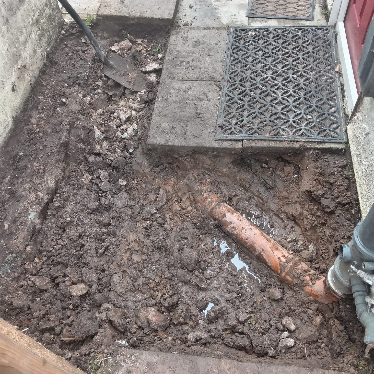 Excavated drain run alongside doorstep during repairs Preston