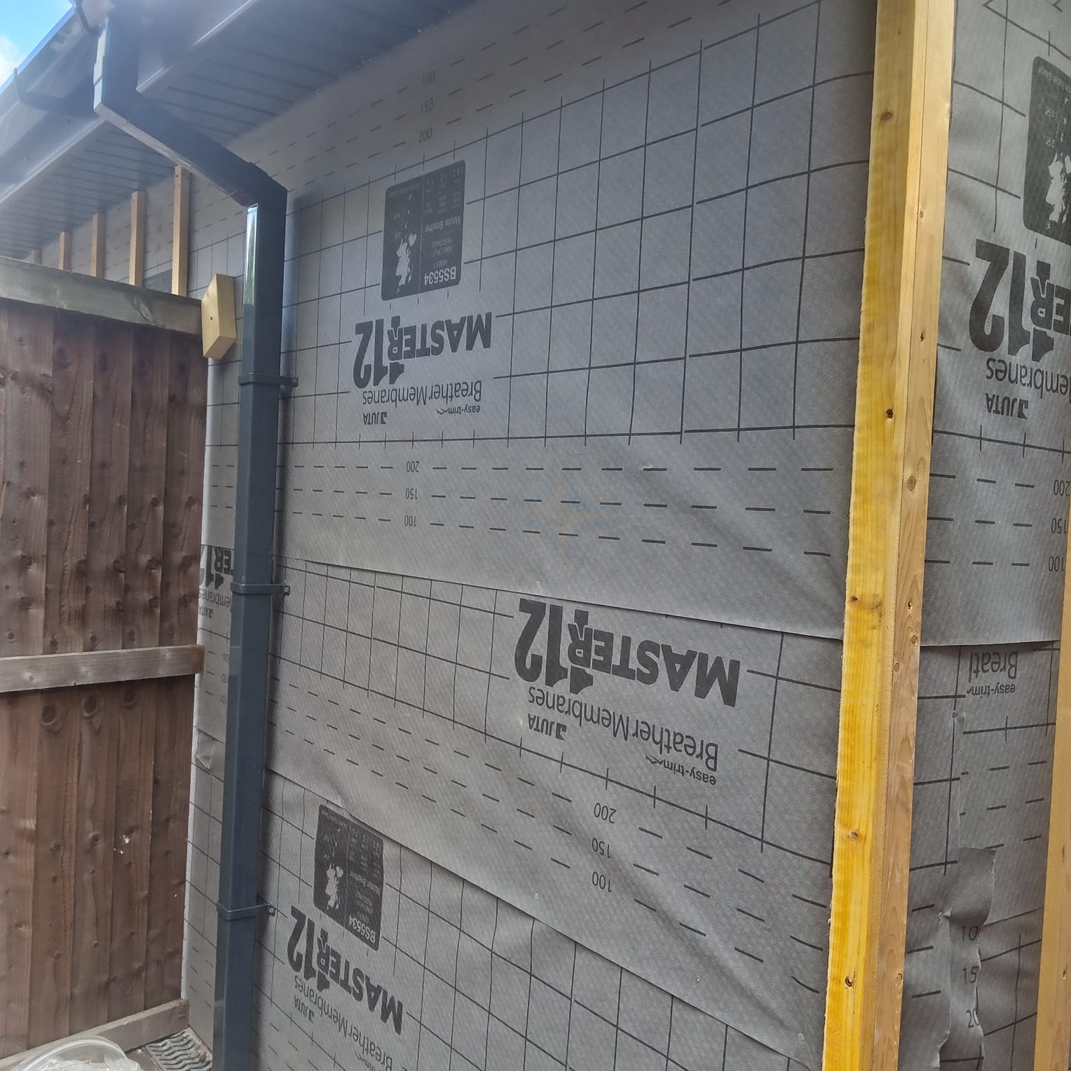 Timber frame outbuilding with breather membrane and new guttering Preston