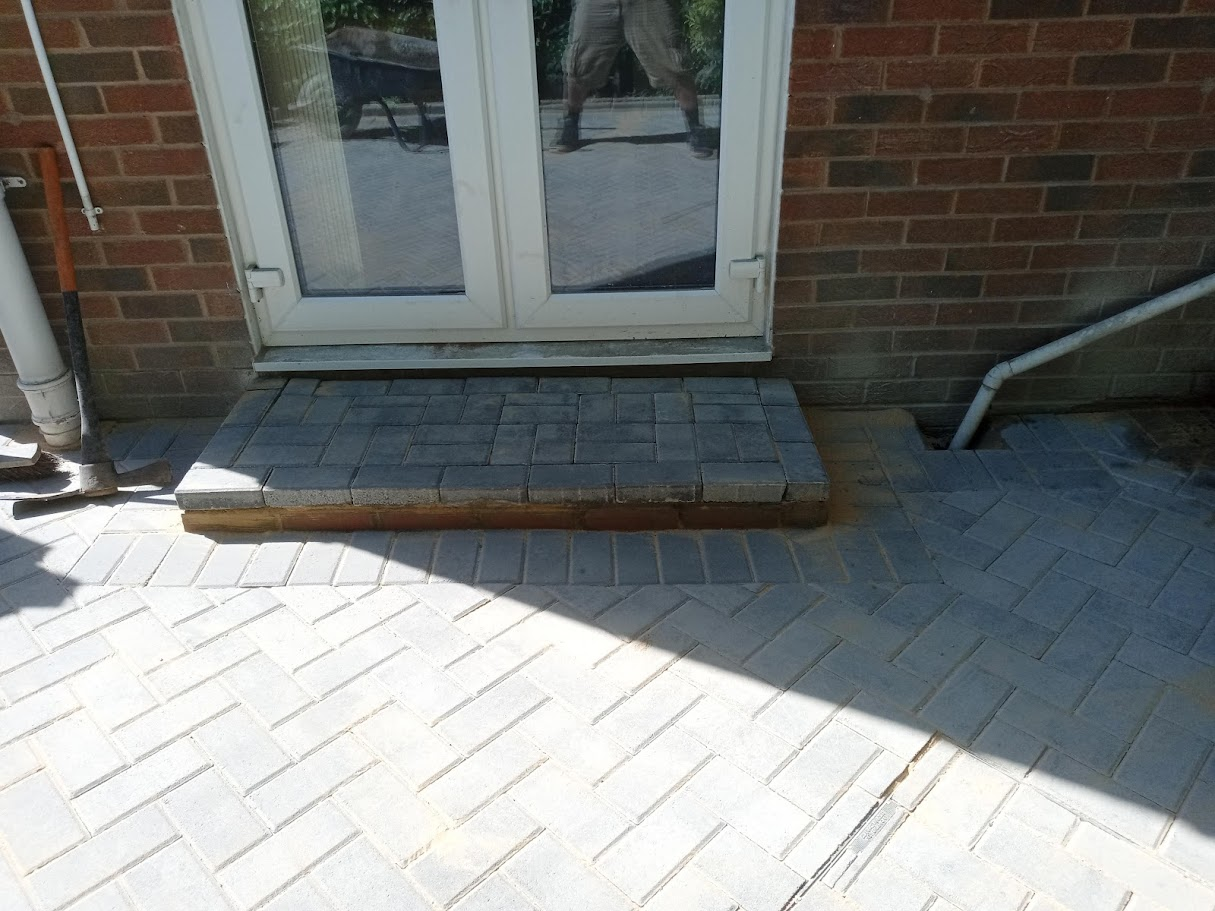 Block paving with stepped doorway
