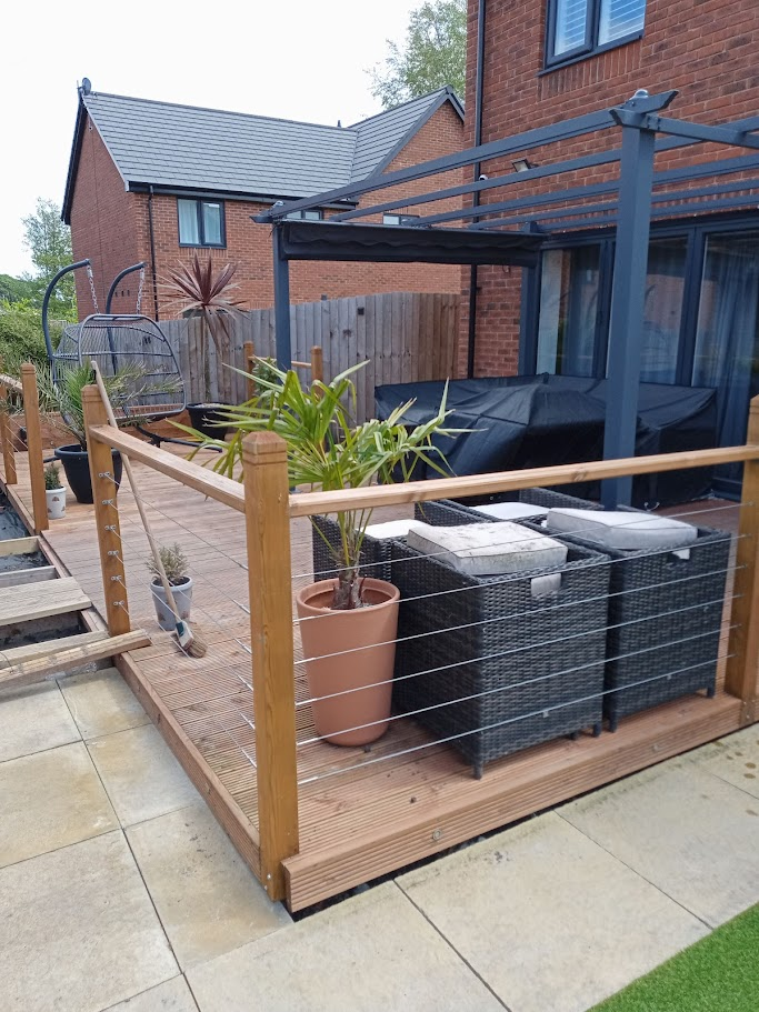 Composite decking with pergola and railing